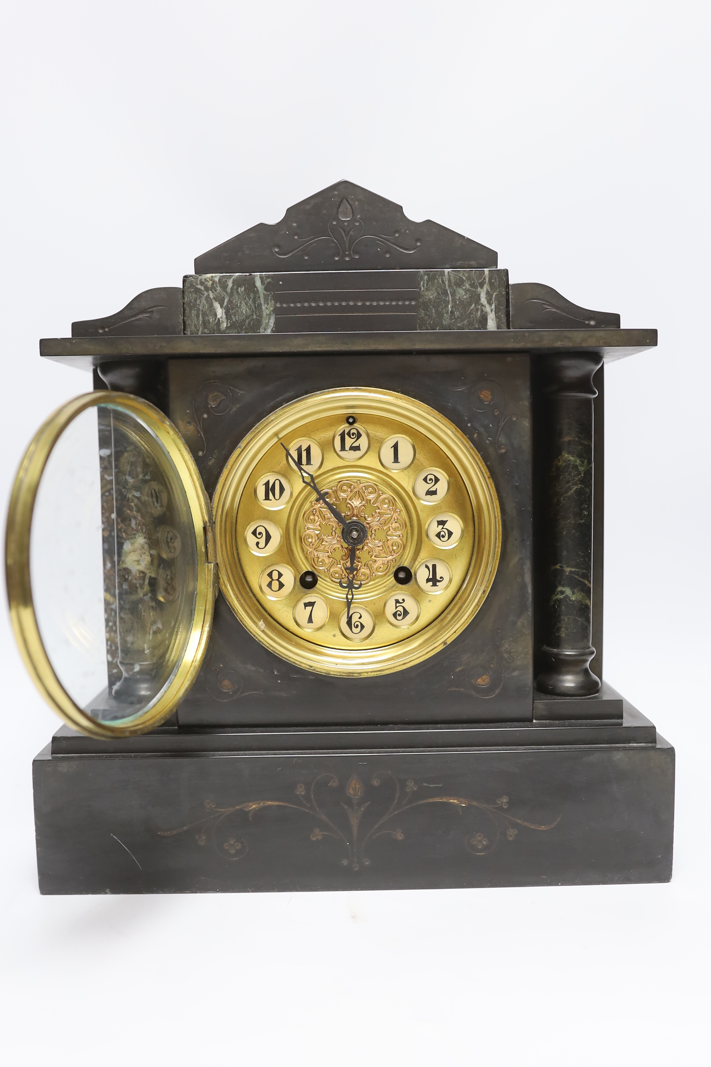 A slate and marble mantel clock with Arabic dial, 29cm high